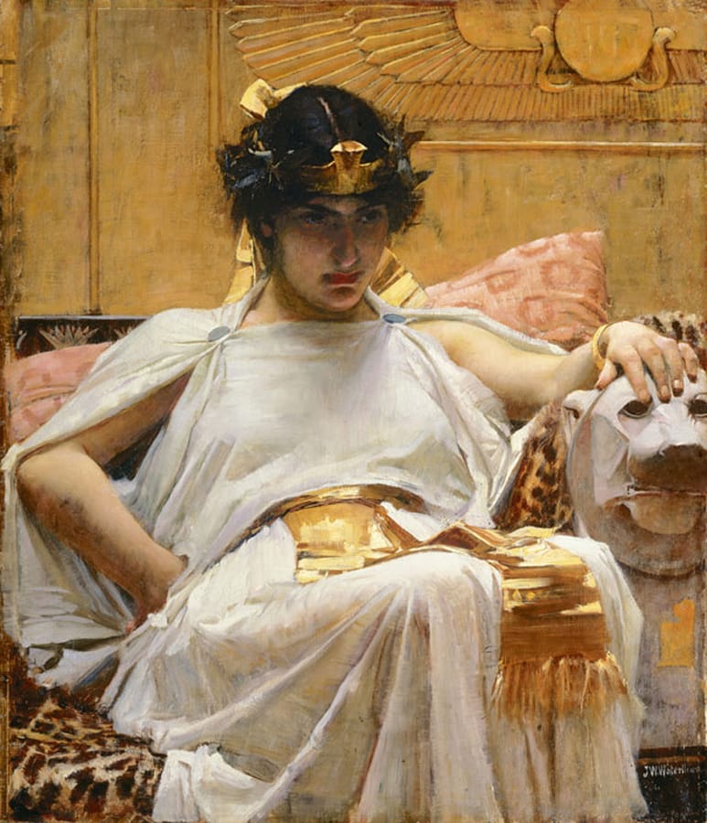 The Favourites of the Emperor Honorius.
Waterhouse
Seated woman in white robe, adorned with a gold headdress, gazes intently forward. She rests on a throne with a carved lion armrest. Regal and contemplative.