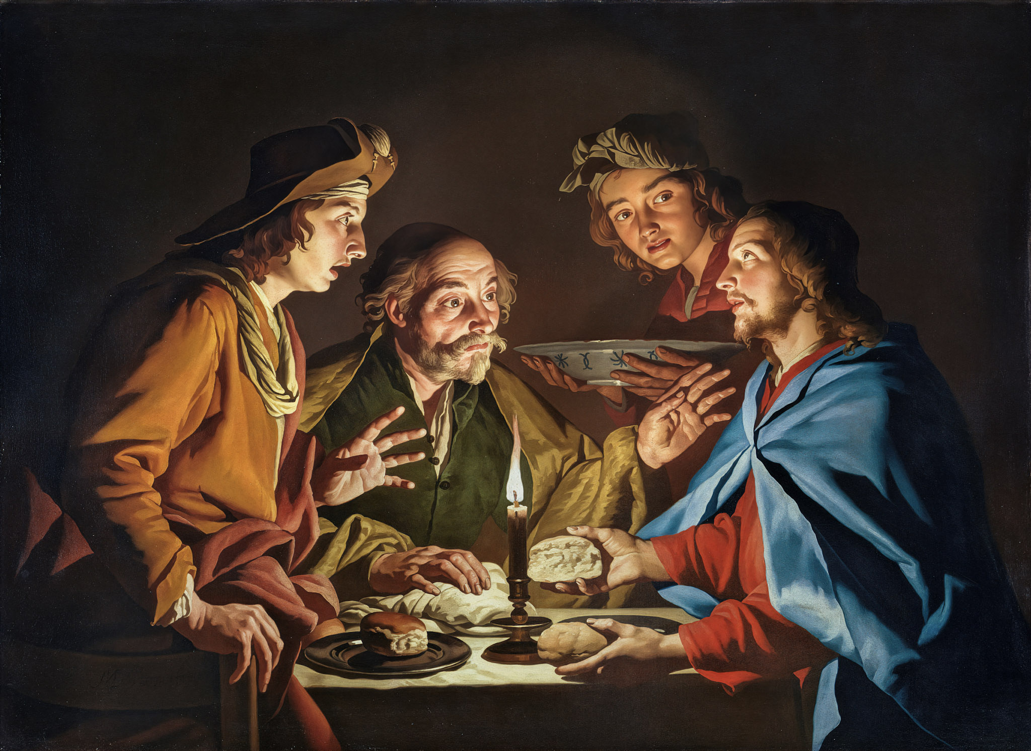 A group of four people are gathered around a candlelit table, sharing bread. Their expressions are intense and focused, creating a dramatic and warm atmosphere.