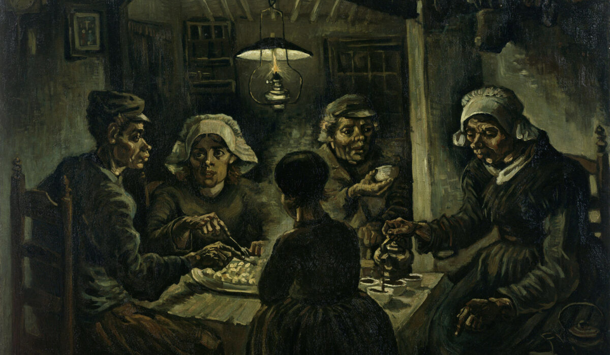Five people sit around a dimly lit table, sharing a meal of potatoes. The somber lighting and expressions convey a mood of simplicity and hardship.