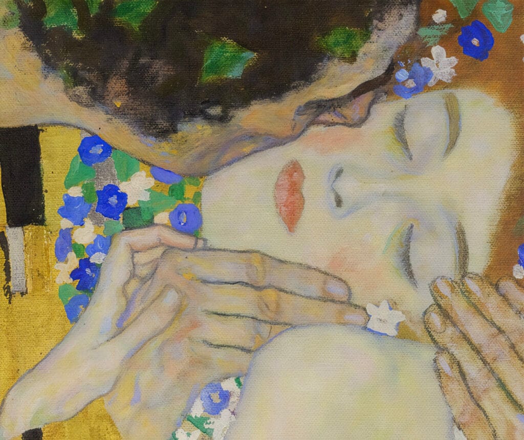 A man tenderly kisses a woman’s cheek. She has closed eyes, red lips, and is surrounded by blue and white flowers, exuding serenity and affection.