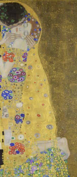 A man and woman embrace, wrapped in intricate golden patterns. The woman closes her eyes, conveying tenderness. A field of flowers lies beneath them.