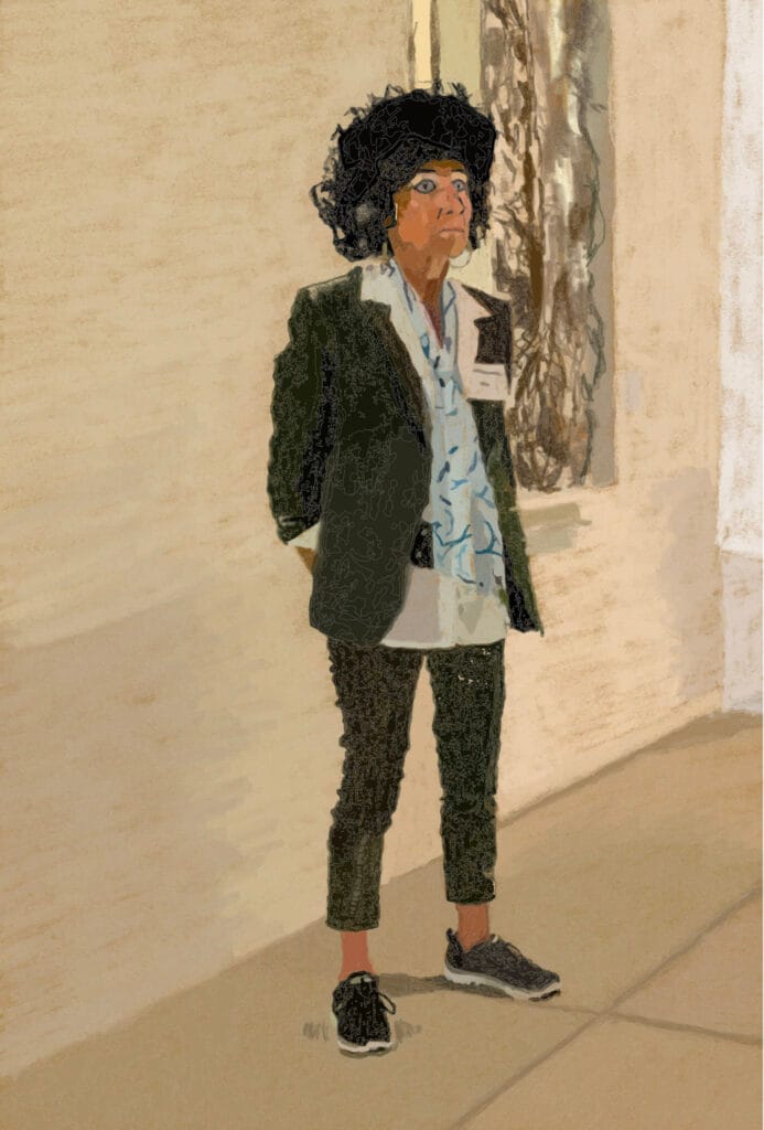 museum visit. A person with curly black hair leans against a beige wall. They wear a dark jacket, patterned shirt, cropped pants, and black sneakers, conveying a casual, thoughtful look.